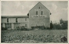 Trzciel / Tirschtiegel - Haus in zwei Ländern : Durch obenstehendes Haus geht die deutsch-polnische Grenze