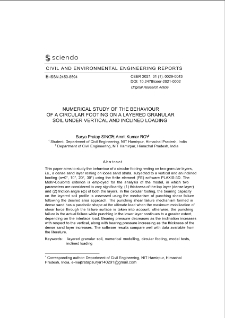 Numerical Study of the Behaviour of a Circular Footing on a Layered Granular Soil Under Vertical and Inclined Loading